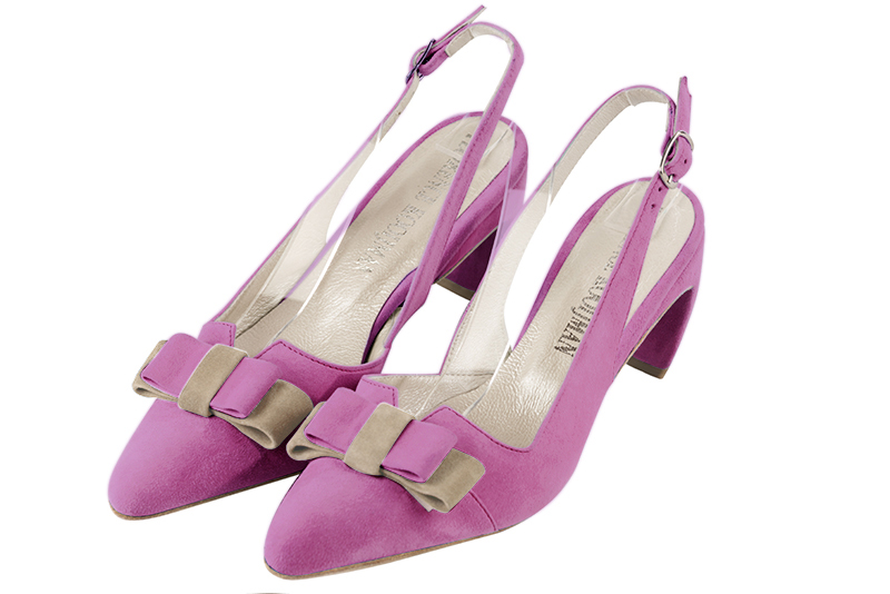 Shocking pink women's open back shoes, with a knot. Tapered toe. Medium comma heels. Front view - Florence KOOIJMAN
